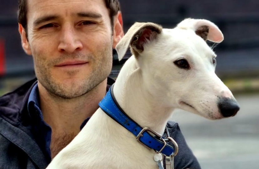 Luke with one of his two whippets