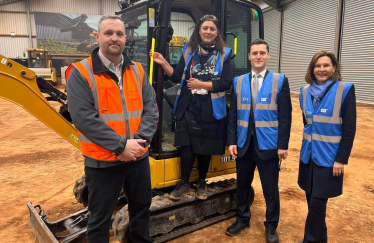 Dr Luke Evans and Nusrat Ghani at Caterpillar in Desford